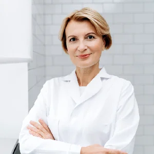 Portrait of a dental specialist in a white coat, endodontist in Brentwood.